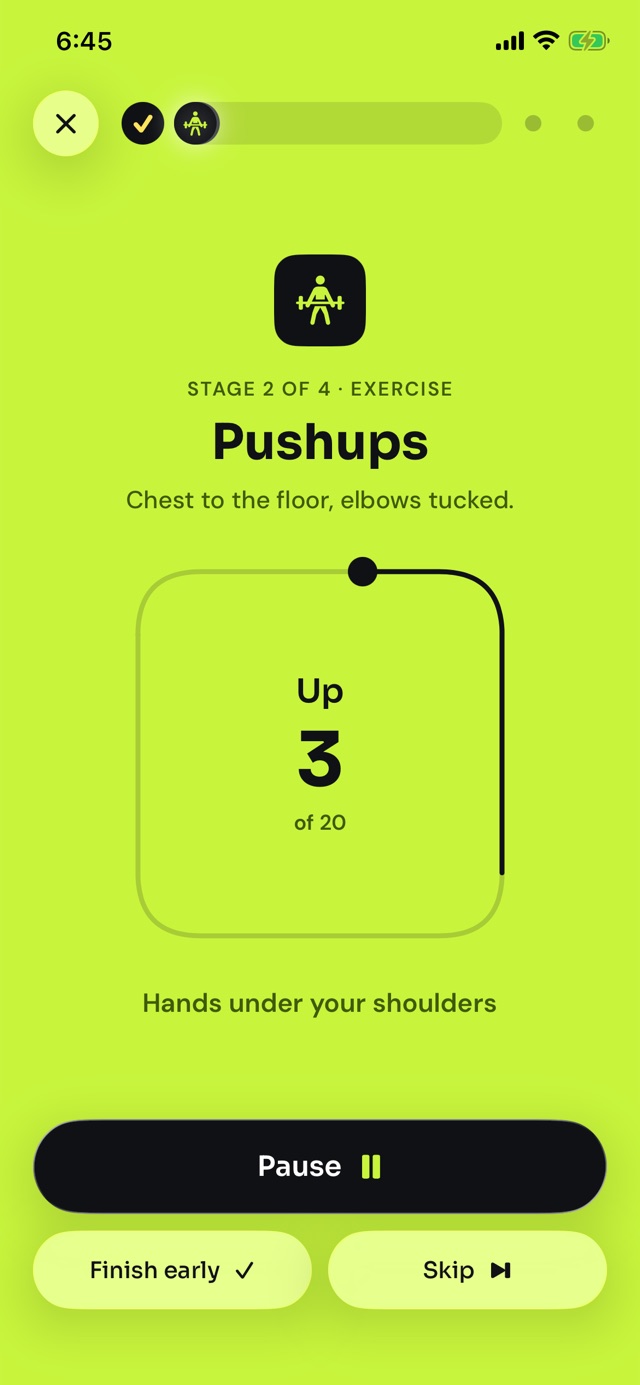 Stage 2, pushups, on a lime page: the pace dot moves around a box, rep 3 of 20.
